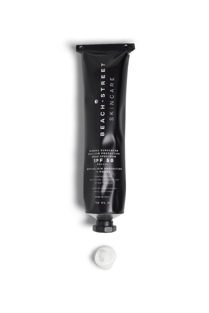Black sunscreen tube with 'Beach Street Skincare' branding on a white background